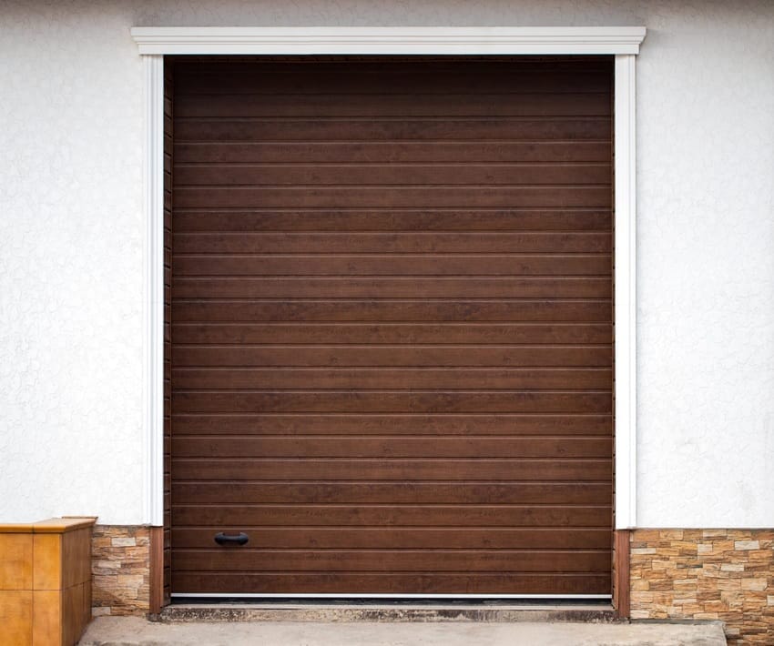 PUERTA DE GARAJE IMITACIÓN MADERA EN Benalmádena